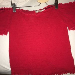 Red off the shoulder shirt